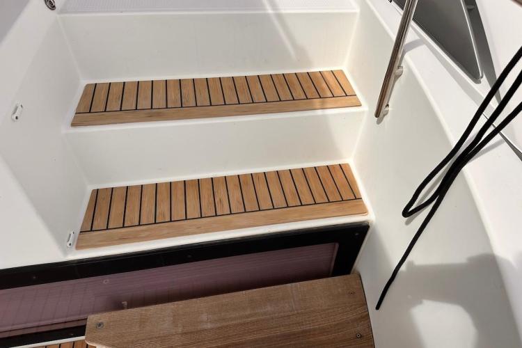 Teak steps on 2016 Fountaine Pajot Ipanema 58 yacht deck.