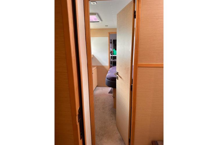 Interior view of 2016 Fountaine Pajot Ipanema 58 yacht cabin hallway.