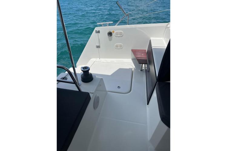 2023 Fountaine Pajot Astrea 42 Catamaran deck with seating, overlooking blue ocean waters.