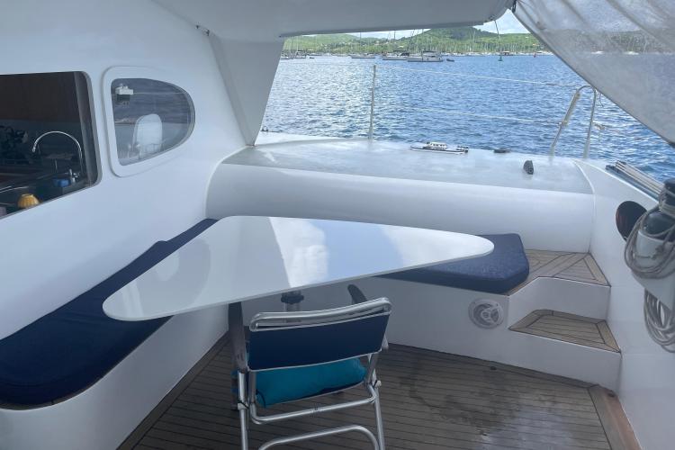 Cozy seating area on 2010 Custom KSENIA 149 yacht with ocean view.