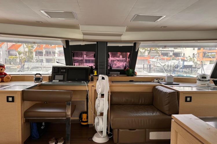 Luxurious interior of 2016 Fountaine Pajot Ipanema 58 catamaran with modern navigation equipment.