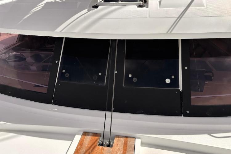 2016 Fountaine Pajot Ipanema 58 yacht deck with sleek windows and modern design.