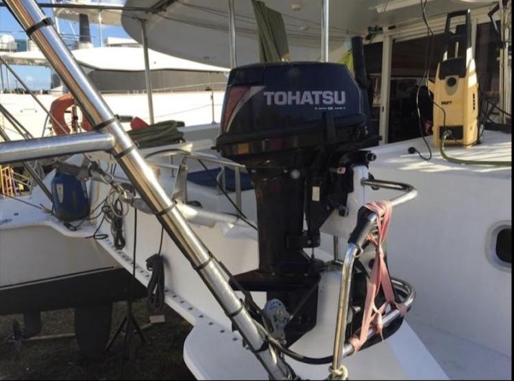 2009 Fountaine Pajot Orana 44 catamaran with Tohatsu outboard motor on deck.