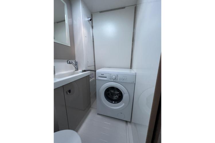 Laundry area in 2023 Fountaine Pajot Astrea 42 Catamaran with washing machine and sink.
