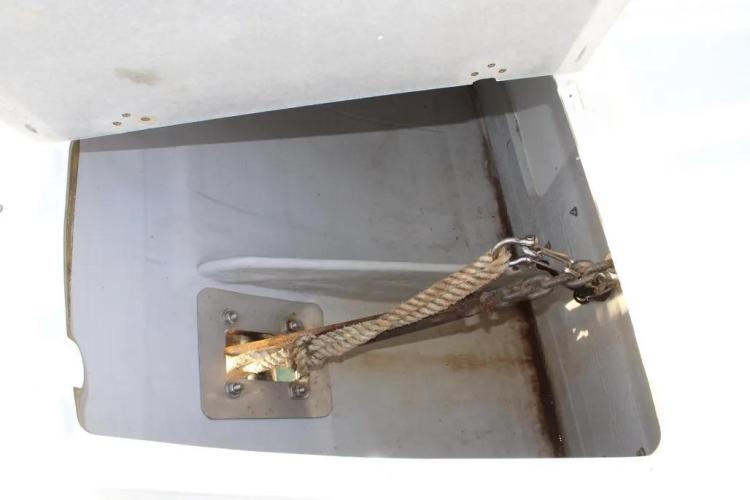 Storage compartment with rope inside a 2017 Fountaine Pajot SABA 50 yacht.