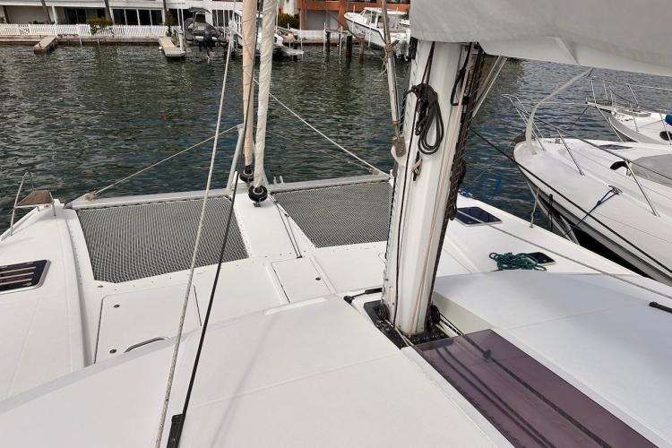 2016 Fountaine Pajot Ipanema 58 catamaran docked, showcasing deck and rigging details.