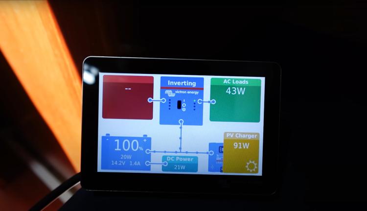 Display screen showing power management on a 2005 Beneteau Cyclades 43.3 yacht.