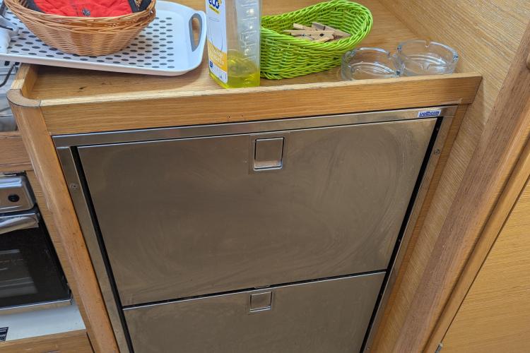 Galley area of 2017 Dufour 460 Grand Large yacht with stainless steel appliances.