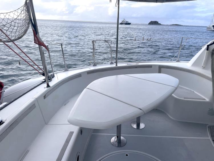 2006 Fountaine Pajot Bahia 46 catamaran deck with ocean view and seating area.