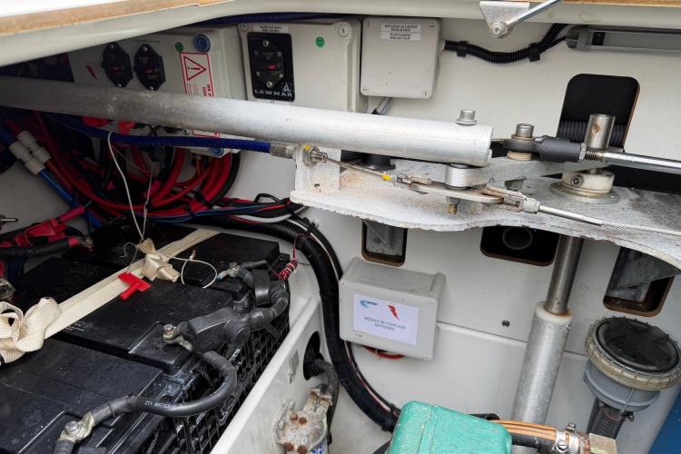 Engine compartment of a 2020 Fountaine Pajot Astrea 42 catamaran, showing battery and wiring.