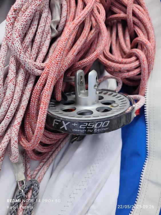 Coiled climbing rope with FX+2500 pulley on Custom Patago 40, 2019 model.