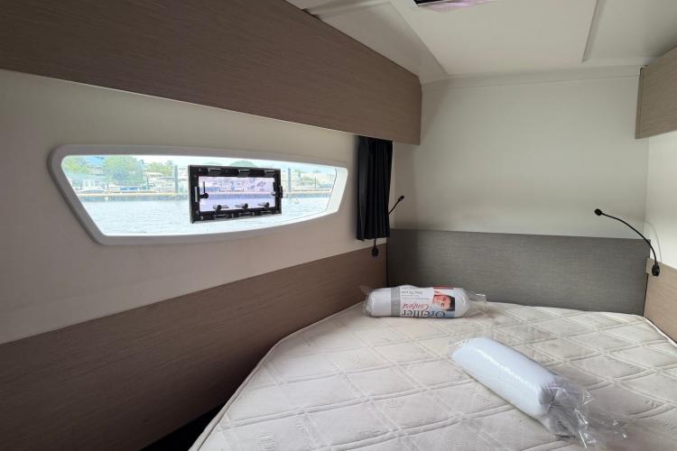 Interior cabin of 2020 Fountaine Pajot Astrea 42 catamaran with window view.