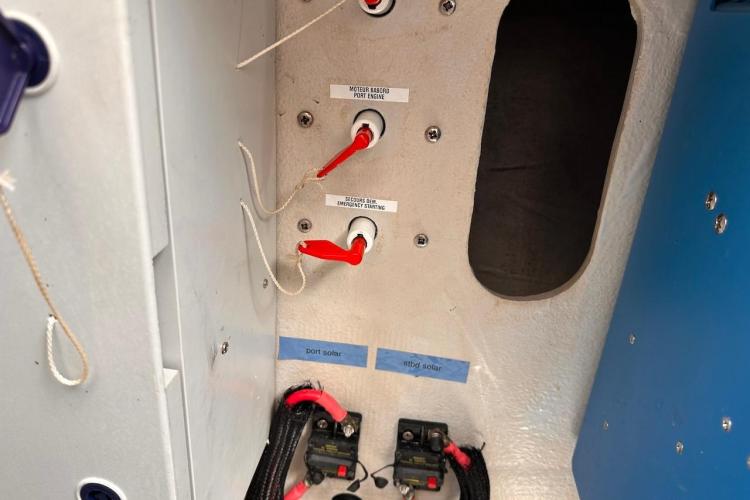 Electrical panel on 2016 Fountaine Pajot Ipanema 58 catamaran with labeled switches and wiring.