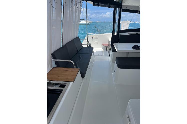 2023 Fountaine Pajot Astrea 42 Catamaran interior with seating and ocean view.