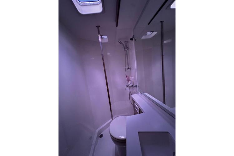 Bathroom interior of 2016 Fountaine Pajot Ipanema 58 yacht, featuring modern fixtures.