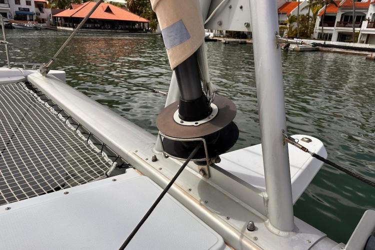 2016 Fountaine Pajot Ipanema 58 catamaran deck with netting and marina view.