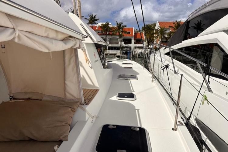 2016 Fountaine Pajot Ipanema 58 catamaran deck with sunshade and marina view.