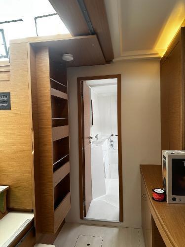 Interior of 2024 Excess 11 yacht with modern wood finish and sleek design.