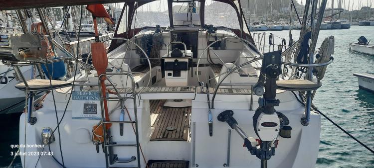 Sailing yacht Elan Impression 434, 2007 model, docked in a marina with visible cockpit and equipment.