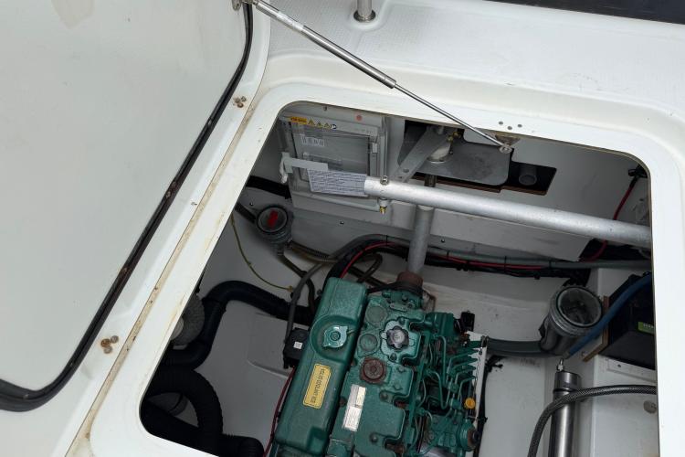 Engine compartment of a 2020 Fountaine Pajot Astrea 42 catamaran, showcasing mechanical components.