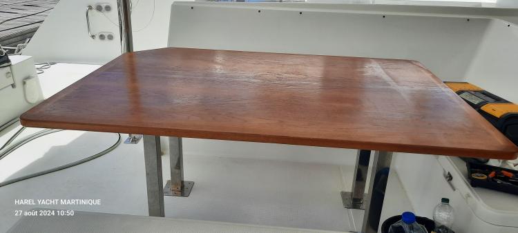 Wooden table on 2017 Fountaine Pajot SABA 50 yacht deck, Harel Yacht Martinique.