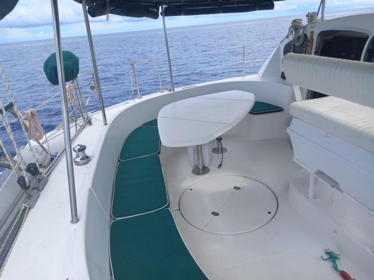 1999 Fountaine Pajot Bahia 46 catamaran deck with seating and ocean view.