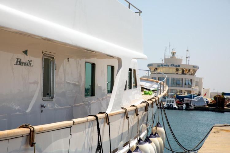 1972 Benetti 33 yacht docked at a marina, showcasing sleek design and luxury.