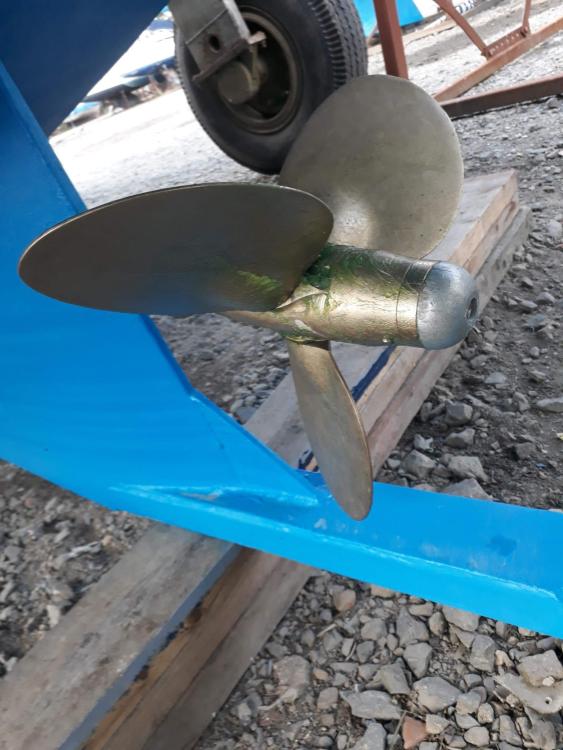 Propeller of 2019 Custom Patago 40 boat on gravel surface.