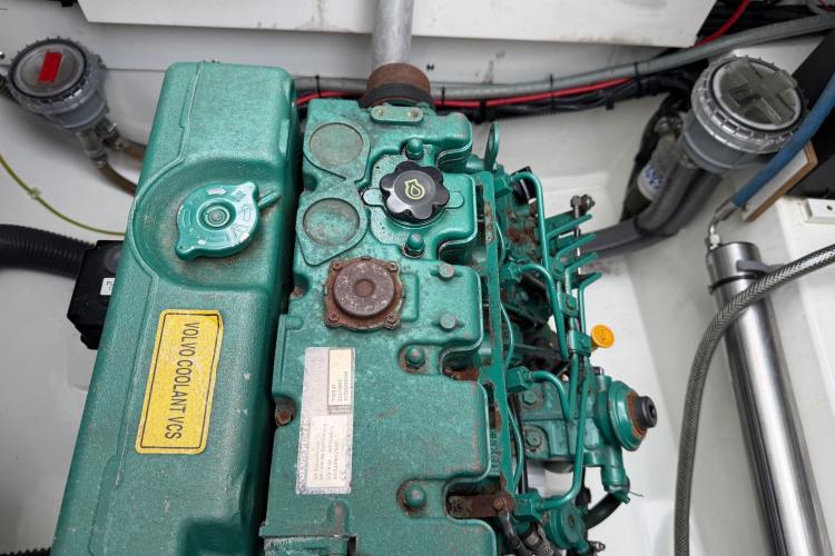 Engine compartment of a 2020 Fountaine Pajot Astrea 42 catamaran, featuring a Volvo coolant system.
