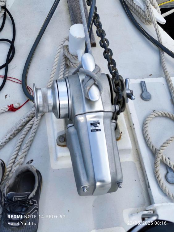 Anchor winch on 2019 Custom Patago 40 yacht deck with ropes and chains.