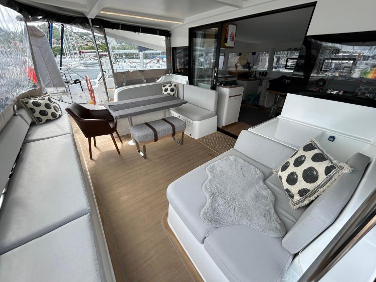 Luxurious 2024 Excess 14 yacht interior with modern seating and stylish decor.