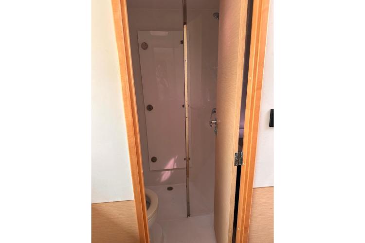 Bathroom interior of 2016 Fountaine Pajot Ipanema 58 yacht, featuring modern design.