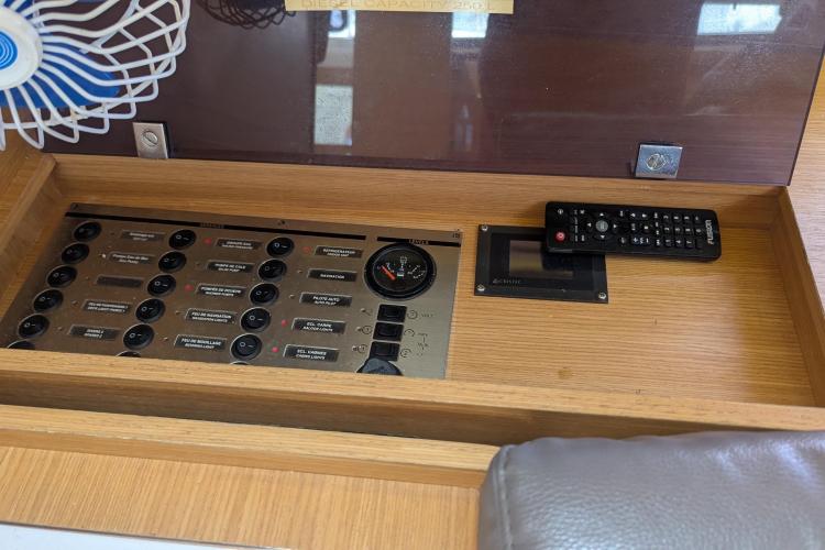 Control panel of 2017 Dufour 460 Grand Large yacht with remote and fan.