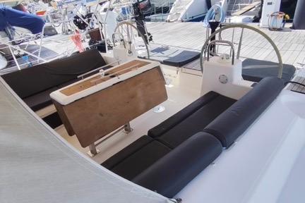 2017 Dufour 460 Grand Large yacht cockpit with dual steering wheels and seating.