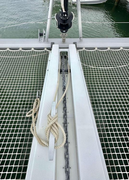2023 Lagoon 46 catamaran deck with netting and rope details.